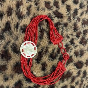 Vibrant Red Beaded coral Necklace with Shell Accent